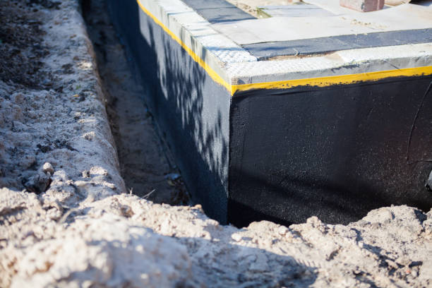 Professional Basement Waterproofing technician working in Peshtigo, WI